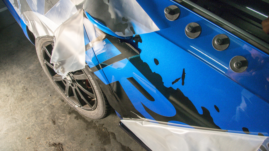 Vehicle wrapped with printable PPF that has a graphic on it.